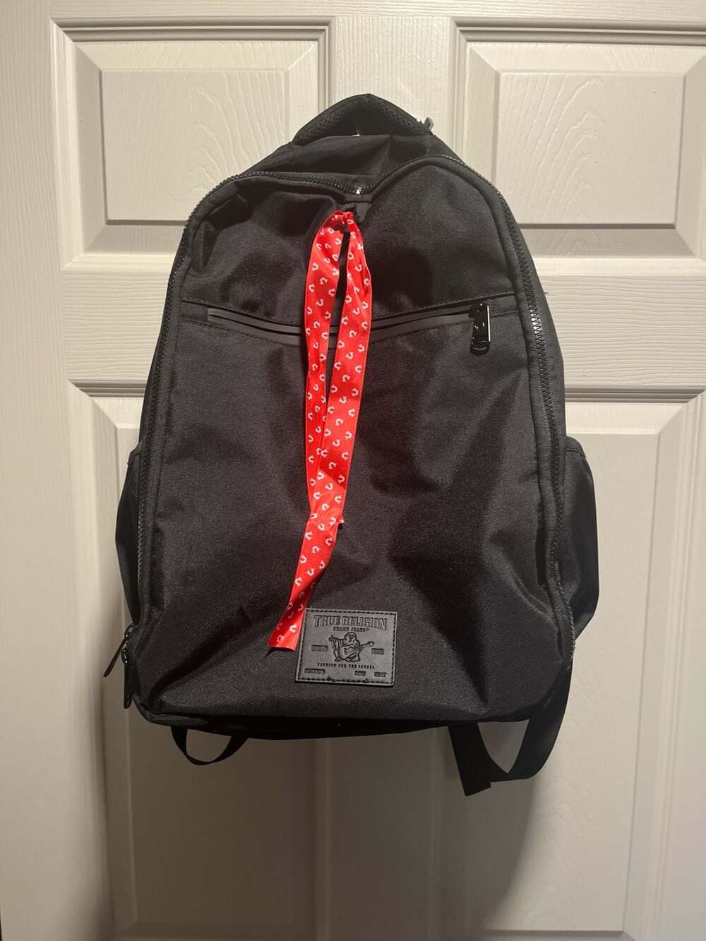 True Religion Black Laptop Backpack with Red Horseshoe Ribbon Pull